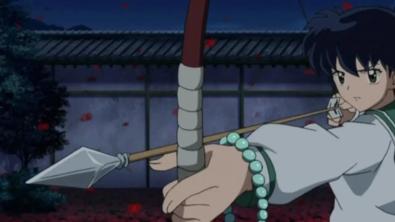 Kagome se prépare à tirer sa flèche sacrée sur Naraku à Inuyasha ; L'Acte final.