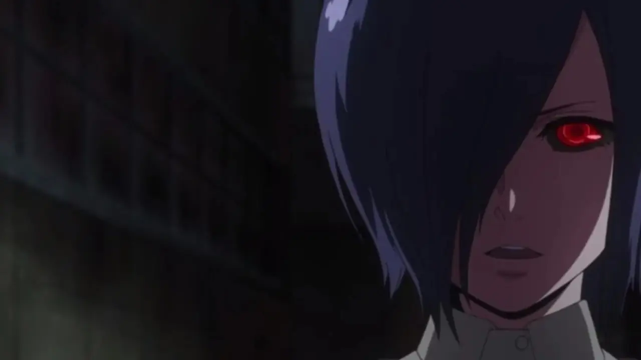 Touka habla con Kaneki mientras sus ojos se ponen rojos con sus poderes de Ghoul manifestándose en Tokyo Ghoul.