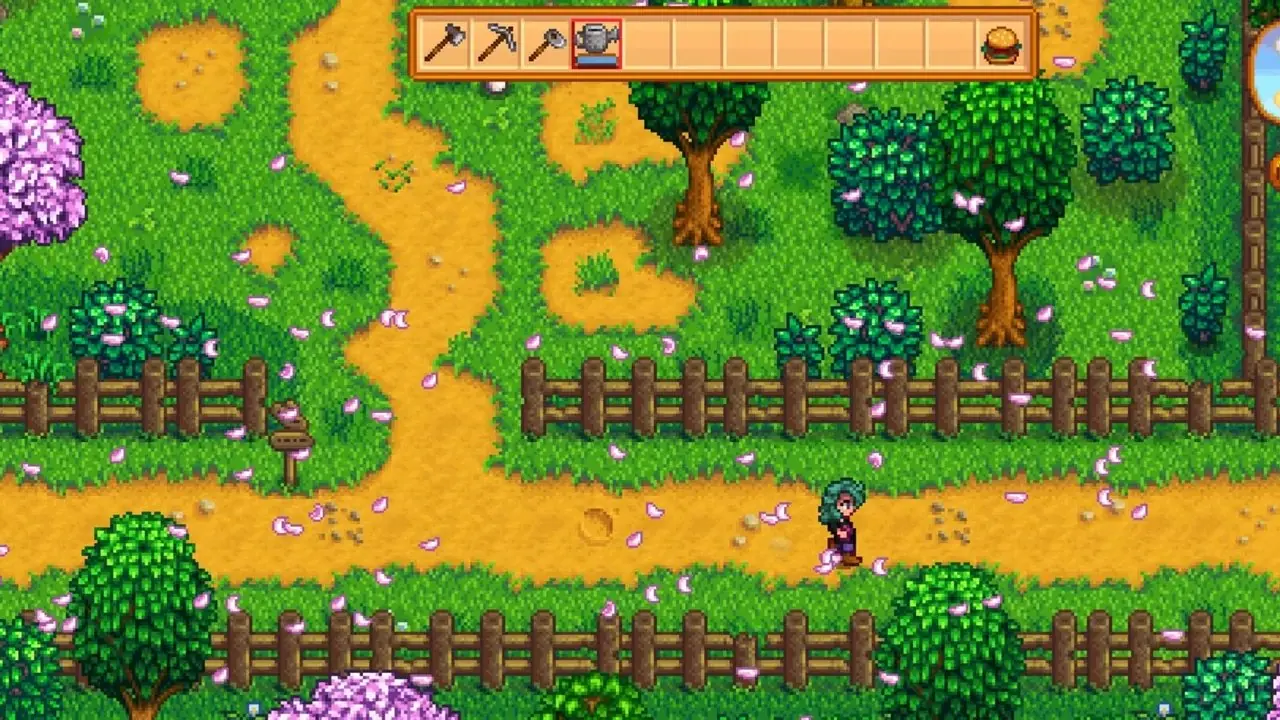 Postać gracza łowiąca ryby w Stardew Valley