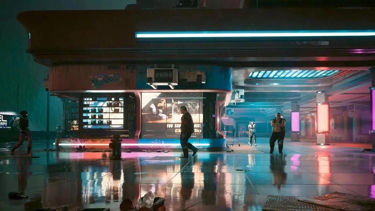 cyberpunk 2077 conduciendo por la ciudad nocturna con carteles del cuerpo al frente