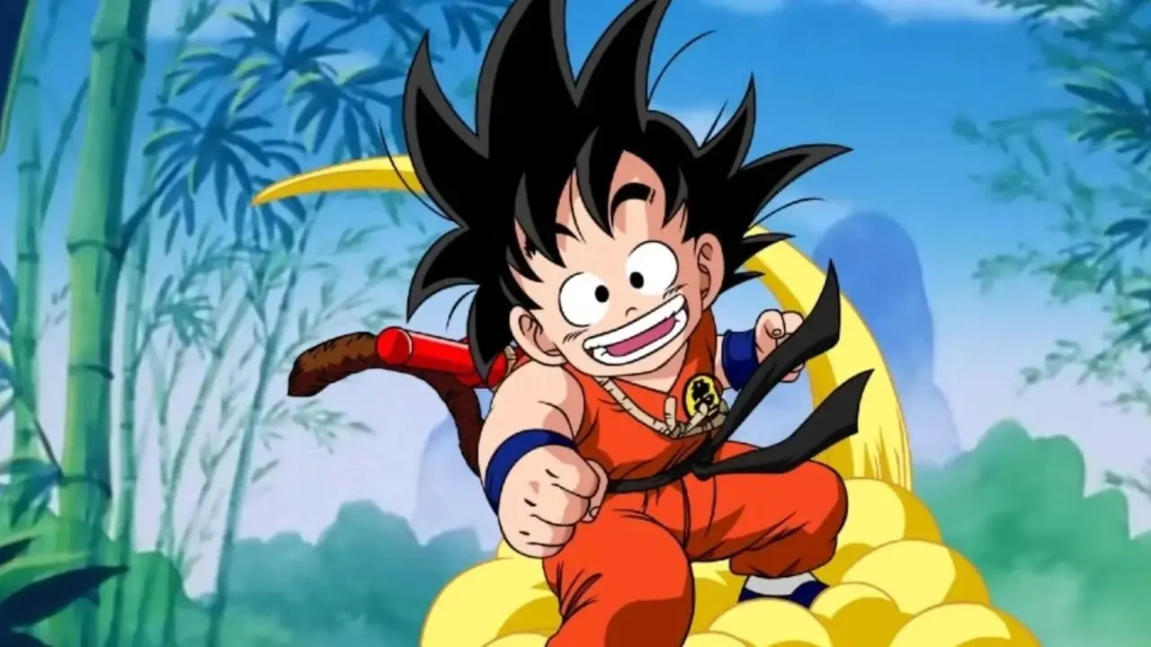 Dragon Ball Z il giovane Goku che cavalca una nuvola sorridente
