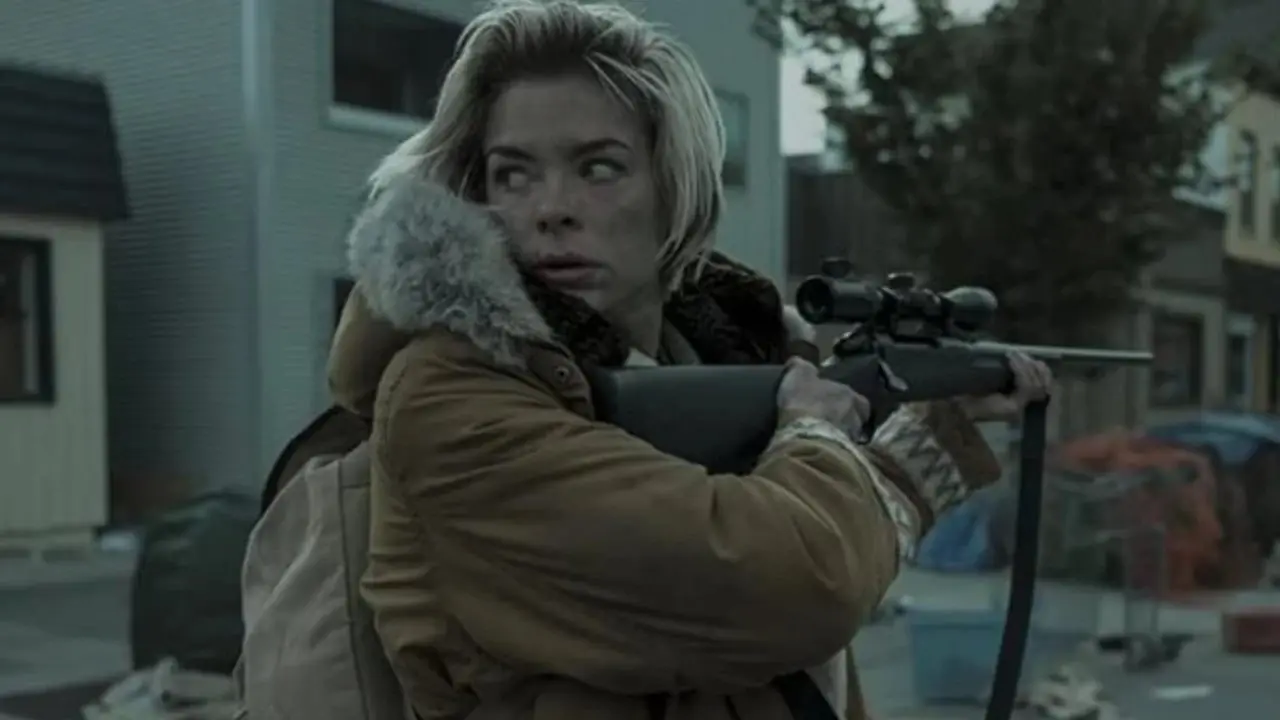 نيغان مع لوسيل في فيلم The Walking Dead