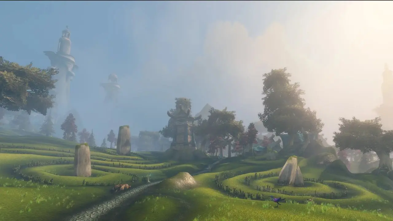 黒い画面に World of Warcraft のロゴが表示されている Nintendo Switch 2 本体がコンクリートの表面に置かれ、幾何学模様の青緑の光で照らされています。