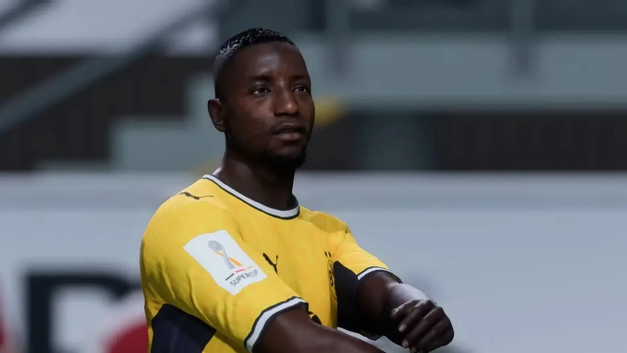 Das EA Sports-Logo vor einem verschwommenen Stadion von EA Sports FC 27