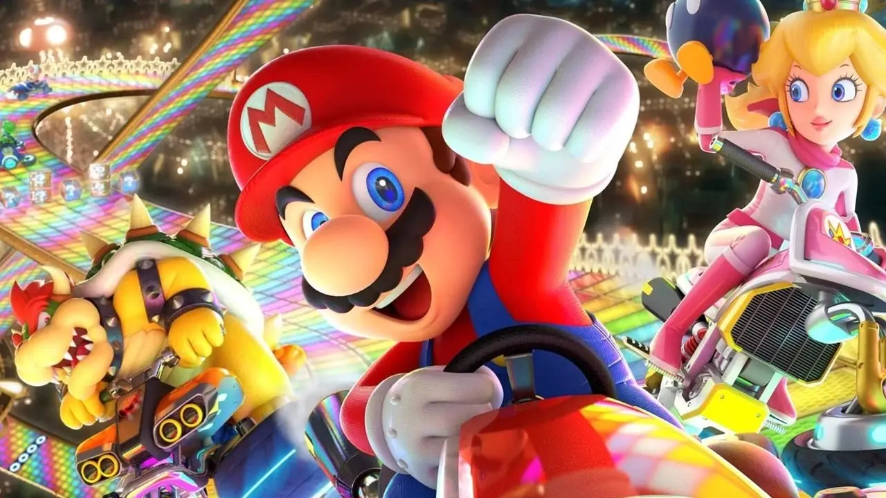 Mario Kart 8 Deluxe Box art con Mario, Bowser y Peach en Rainbow Road